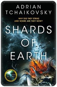 Book cover: “Shards of Earth” by Adrian Tchaikovsky (Orbit, 2021); audiobook read by Sophie Aldred (Pan Macmillan, 2021)