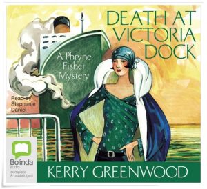 Book cover: “Death at Victoria Dock” by Kerry Greenwood (Poisoned Pen Press, 1992); audiobook read by Stephanie Daniel (ABC, 2011)