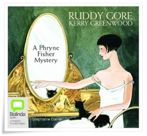 Book cover: “Ruddy Gore” by Kerry Greenwood (McPhee Gribble, 1995); audiobook read by Stephanie Daniel (Bolinda, 2010)
